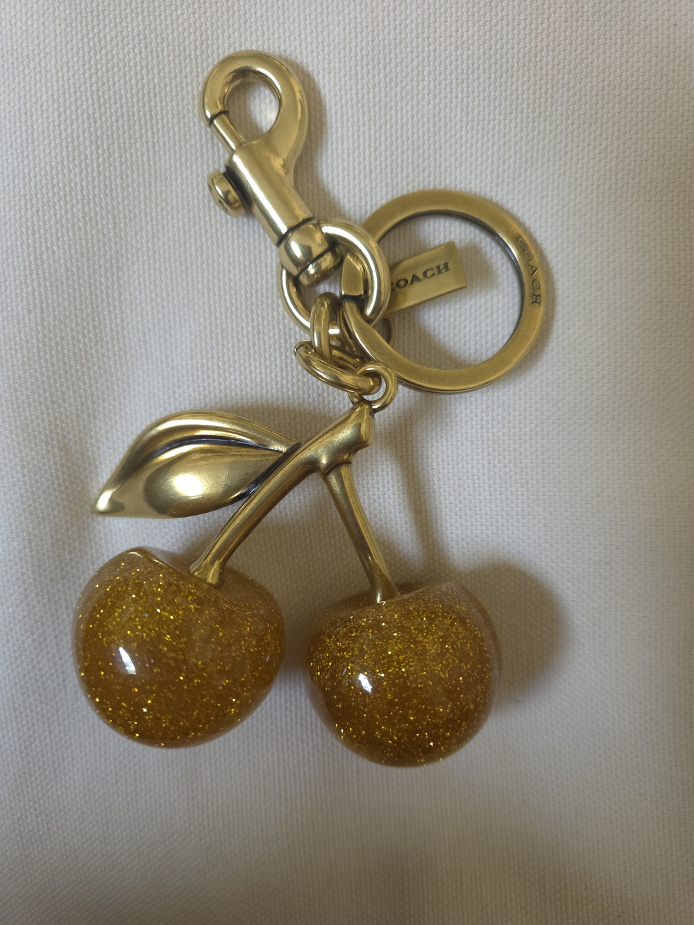 Coach Gold-Tone Glitter Cherry Key Charm